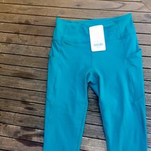 Fabletics Oasis High-Waisted Pocket 7/8 Turquoise